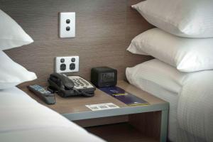 Cama o camas de una habitación en DoubleTree by Hilton Cairns