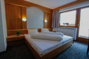 Postel nebo postele na pokoji v ubytování Hotel Tia Apart + 31 fotografií
