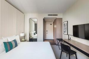 Postel nebo postele na pokoji v ubytování DoubleTree by Hilton Melbourne