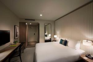 Postel nebo postele na pokoji v ubytování DoubleTree by Hilton Melbourne