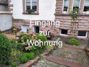 an image of a house with the words emerging zirigham at Casa Viva - Separate, ruhig gelegene Wohnung in Quierschied
