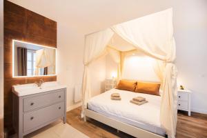 Postel nebo postele na pokoji v ubytování Le Laurencin Sens - Le Duplex - Cœur de ville