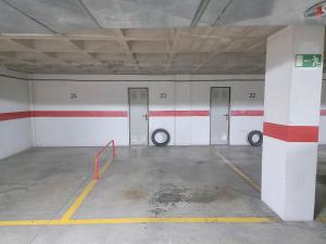 an empty parking garage with four lockers in it at MEDANO4YOU Brisas Del Atlantico in El Médano