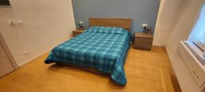 Un pat sau paturi într-o cameră la Affittacamere Le Vele