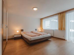 Posteľ alebo postele v izbe v ubytovaní Apartment Sattlerweg by Interhome