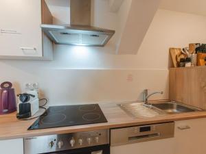 Kuchyňa alebo kuchynka v ubytovaní Apartment Sattlerweg by Interhome + 28 fotografií