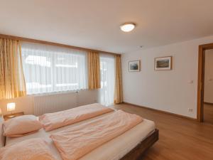 Posteľ alebo postele v izbe v ubytovaní Apartment Sattlerweg by Interhome