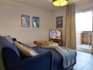 TV a/nebo společenská místnost v ubytování Apartment Lantau by Interhome