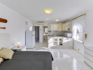 Kuchyň nebo kuchyňský kout v ubytování Holiday Home Residencia Marítima by Interhome