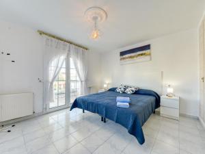 Postel nebo postele na pokoji v ubytování Holiday Home Residencia Marítima by Interhome