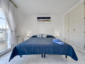 Postel nebo postele na pokoji v ubytování Holiday Home Residencia Marítima by Interhome