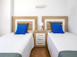 Posteľ alebo postele v izbe v ubytovaní Apartment Hawai by Interhome