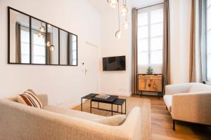 TV a/nebo společenská místnost v ubytování Le Laurencin Sens - La Mezzanine - Cœur de ville