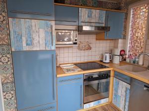 Kuchyň nebo kuchyňský kout v ubytování Holiday Home Heike by Interhome