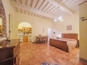 Ένα ή περισσότερα κρεβάτια σε δωμάτιο στο Apartment Le Fornaci-2 by Interhome
