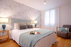Posteľ alebo postele v izbe v ubytovaní Genteel Home San Agustín + 37 fotografií