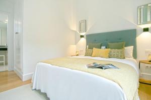 Posteľ alebo postele v izbe v ubytovaní Genteel Home San Agustín