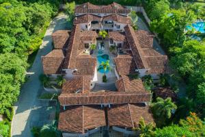 an aerial view of a house with a swimming pool at The Cove 3 at Playa Ocotal in Coco