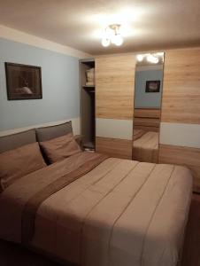 Säng eller sängar i ett rum på Appartamento Biolley