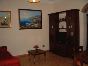 TV a/nebo společenská místnost v ubytování Casa Papacqua