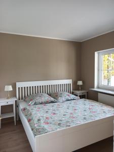 Postel nebo postele na pokoji v ubytování Idyllische Lage im Süden Erfurts