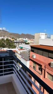 a view of a city from the balcony of a building at GFS Roof in Santa Cruz de Tenerife