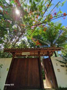Puutarhaa majoituspaikan Mini Casa com Jacuzzi e Piscina ulkopuolella