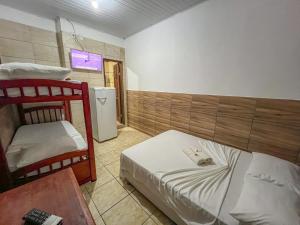 Un ou plusieurs lits superposés dans un hébergement de l'établissement pousada Vitoria