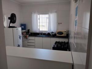 Køkken eller tekøkken på Lar Pieri Rodrigues