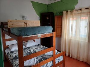 Кровать или кровати в номере Hostel Nature