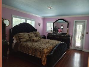 Ένα ή περισσότερα κρεβάτια σε δωμάτιο στο Vacation and party rental