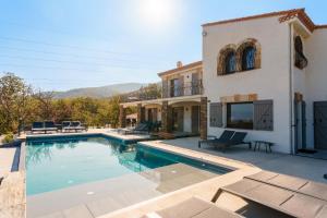 The swimming pool at or close to Mas Sureda - Evasion luxueuse avec vue panoramique