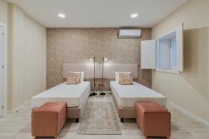 Postel nebo postele na pokoji v ubytování Garrett Premium I