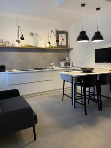 Η κουζίνα ή μικρή κουζίνα στο Greenway Apartment