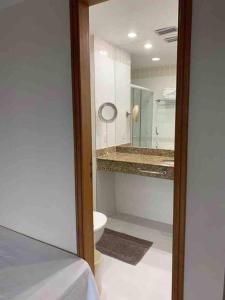 Et badeværelse på Tropical Executive Hotel flat