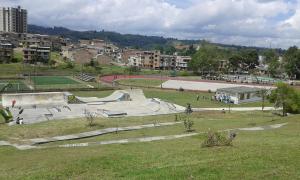 a skate park with a skateboard ramp in a field at EDIFICIO EL MOLINO in Popayan