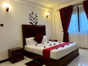 Letto o letti in una camera di Heaven Breeze