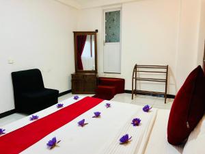 Letto o letti in una camera di Heaven Breeze