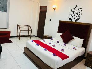 Letto o letti in una camera di Heaven Breeze