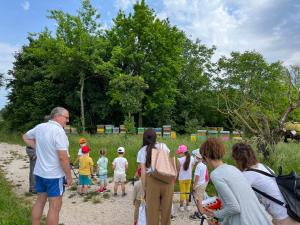 a group of people standing around in a field at Agriturismo da Natalino in Ceggia