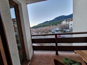 a view from the balcony of a room with a view at Naturaleza Boutique Apartment in Bansko