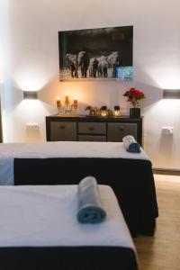 Postel nebo postele na pokoji v ubytování Aparthotel Amella