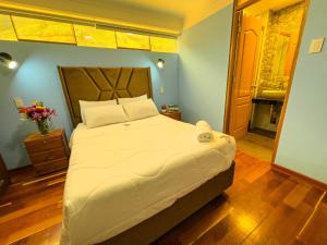 Letto o letti in una camera di Pisonay Hotel