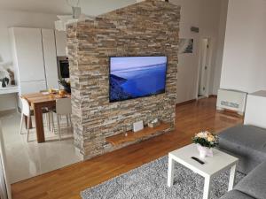 Et tv og/eller underholdning på Apartments Dvor - ap4, ap5, ap6