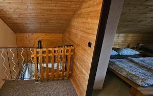 Postel nebo postele na pokoji v ubytování Apartmán v centru Království sov