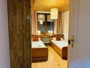 Postel nebo postele na pokoji v ubytování Hotel Nest