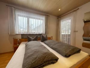 Posteľ alebo postele v izbe v ubytovaní Haus Ausserbach