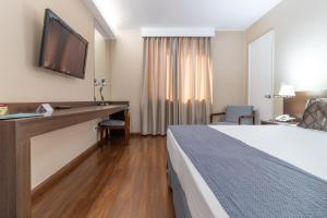 Postel nebo postele na pokoji v ubytování Gran Villagio Hotel SP by Castelo Itaipava