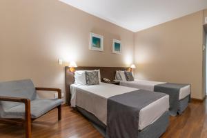 Postel nebo postele na pokoji v ubytování Gran Villagio Hotel SP by Castelo Itaipava