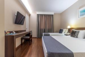 Postel nebo postele na pokoji v ubytování Gran Villagio Hotel SP by Castelo Itaipava